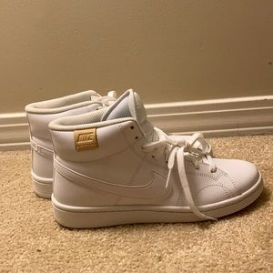 never worn brand new Nike high tops tennis shoes